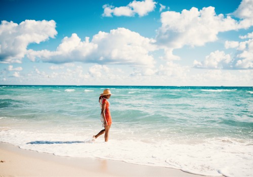 A woman on the beach enjoying her vacation, thanks to excellent Property Management Near You