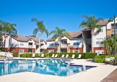 The pool of a condo complex, where condos are rented to vacationers by Rental Property Managers in Wesley Chapel FL